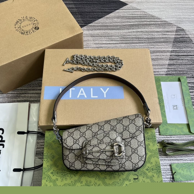 G*u*i top handle bags